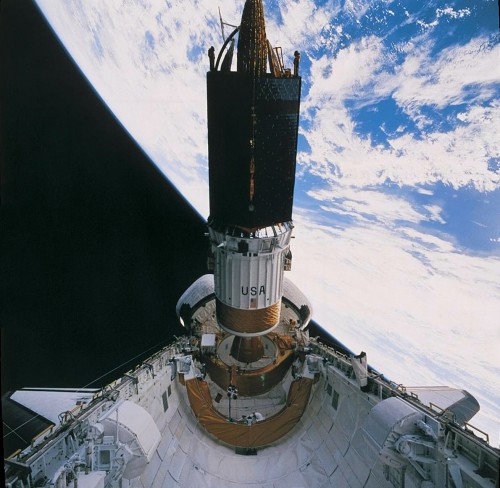 STS-41D, in its original mission incarnation as "STS-12", was tasked with the deployment of a Tracking and Data Relay Satellite (TDRS). However, problems with the Boeing-built Inertial Upper Stage (IUS) booster in 1983 caused this payload to be dropped from the manifest. Photo Credit: NASA