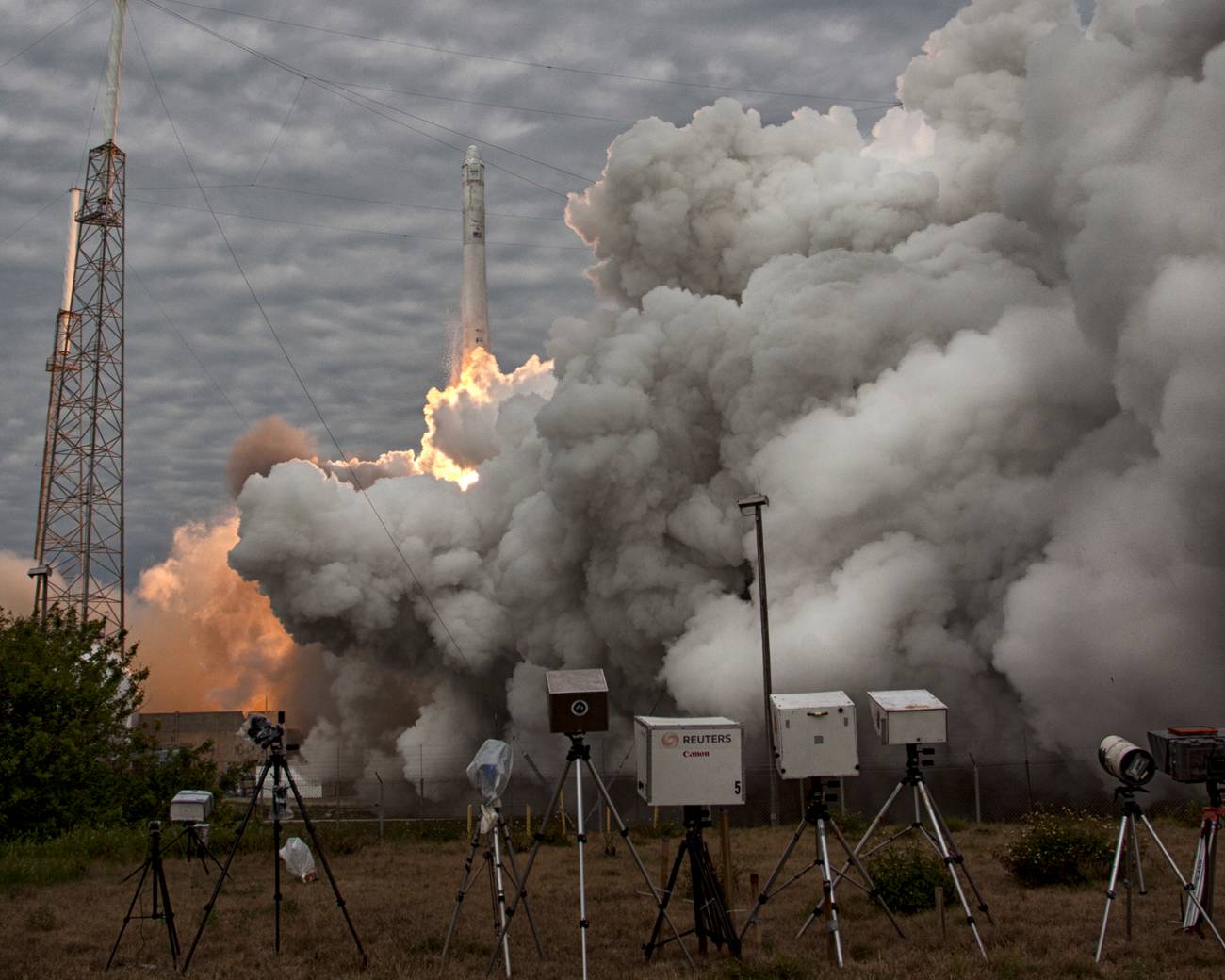 AmericaSpace photo of the launch of SpaceX Falcon with Dragon on NASA mission CRS 2 ...