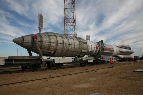 Laden with the Astra 2E communications satellite, Russia's giant Proton-M is rolled horizontally to Pad 39 at Site 200 at Baikonur on Thursday 26 September. Photo Credit: ILS