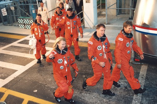 John Blaha leads the STS-58 out to the launch pad. Photo Credit: NASA