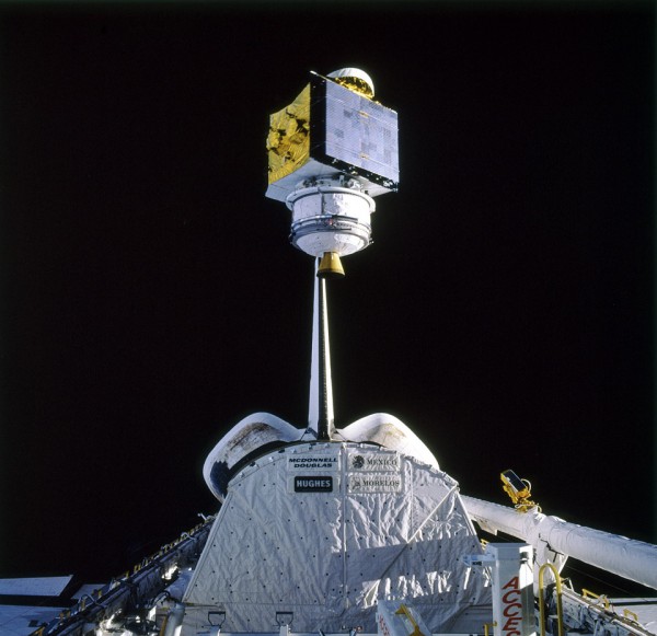 The high-powered Satcom K-2 satellite, atop the first PAM-D2 booster, is deployed from Atlantis' payload bay. Photo Credit: NASA, via Joachim Becker/SpaceFacts.de