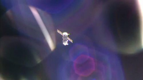 The Soyuz TMA-20M spacecraft disappears into the distance, soon after separation from the International Space Station (ISS). Photo Credit: NASA TV