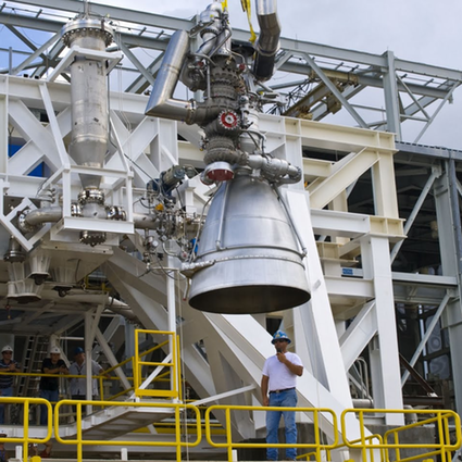 An Aerojet AJ26 rocket engine is prepared to be installed in the E-1 Test Stand at Stennis Space Center. Image credit: NASA