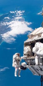 Shuttle Discovery mission specialists Robert Curbeam (left) and Christer Fuglesang work on ISS construction during a spacewalk in 2006. NASA TV will broadcast the next ISS spacewalk of two cosmonauts Feb. 16th. Photo Credit: NASA