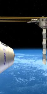 Artist's concept of Boeing's CST-100 crew capsule approaching the International Space Station. NASA has issued a call for industry to submit proposals for the Commercial Crew Integrated Capability Initiative. Image Credit: Boeing