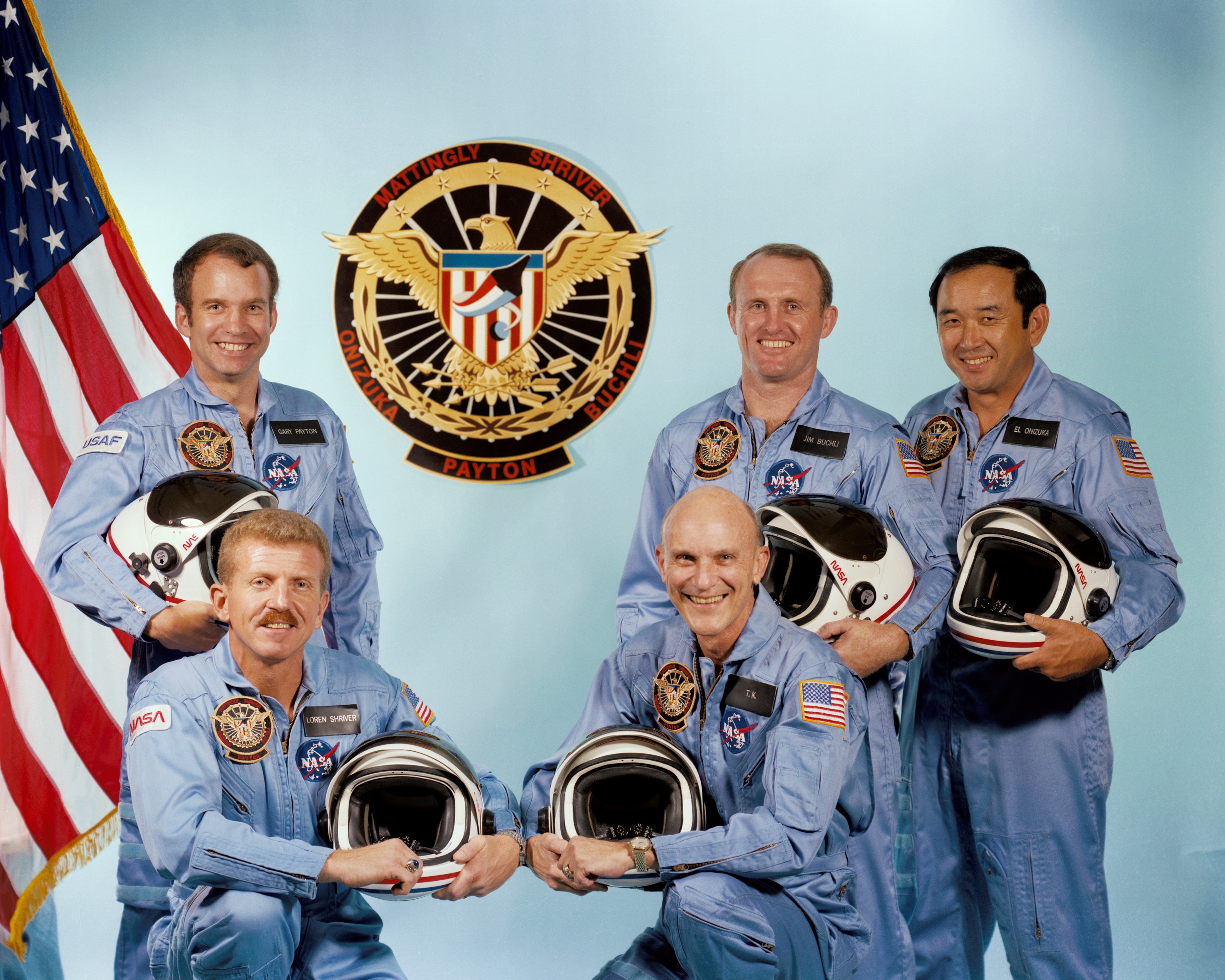 Since the conception of the manned spaceflight engineer programme, the intent was to fly a dedicated officer aboard each classified flight. For Mission 51C, it would be Air Force Major Gary Payton (back left). The other NASA crew members were Loren Shriver (front left) and Ken Mattingly (front right), with Jim Buchli and Ellison Onizuka behind. Photo Credit: NASA