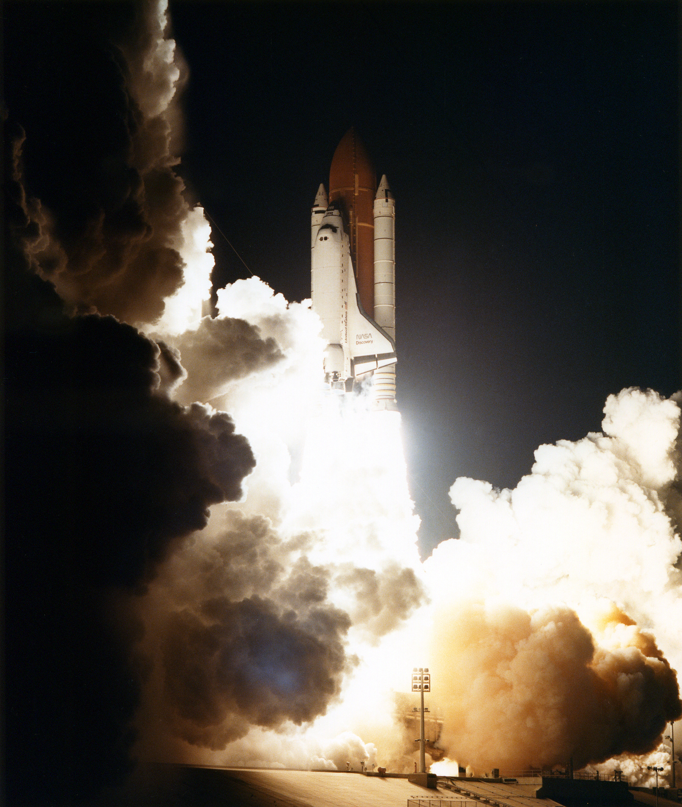 STS-33 was the first nocturnal Shuttle launch and landing of the post-Challenger era; entirely appropriate, perhaps, in light of the shroud of darkness which covered its primary payload. Photo Credit: NASA