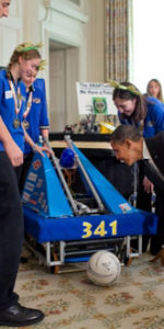 President Obama inspects a robot during the White house Science Fair. Photo Credit: WhiteHouse.gov