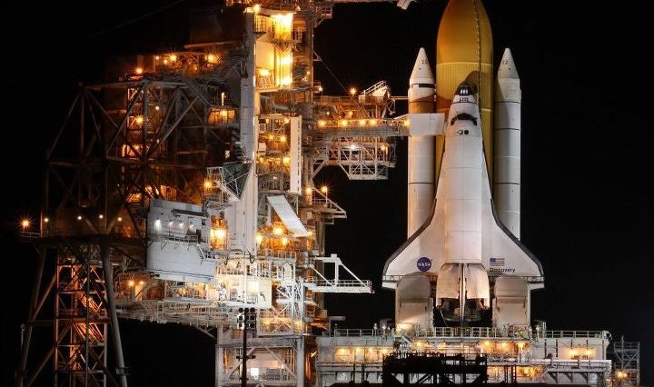 Space shuttle Discovery atop launch pad 39A on the eve of her final launch, STS-133. Photo Credit: Mike Killian