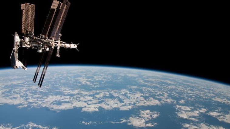 The International Space Station and space shuttle Endeavour docked together, as photographed by Expedition 27 crew member Paolo Nespoli from the Soyuz TMA-20 following its undocking on May 23, 2011. Photo Credit: NASA