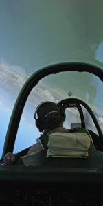 Cruising upside down in a T-28 vintage warbird over Cape Canaveral, previewing this weekend's 35th annual TICO Warbird Airshow. Photo Credit: Mike Killian