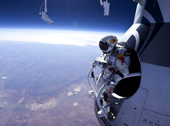 Felix Baumgartner moments before jumping from an altitude of just over 71,000 feet. The jump was a dress rehearsal for a planned record breaking jump from 120,000 feet this summer. Photo Credit: Jay Nemeth/Red Bull Content Pool