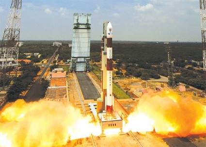 A PSLV-XL launch vehicle, equipped with four stages and six strap-on solid-fuelled rocket boosters, launches from Sriharikota with India's Radar Imaging Satellite (RISAT)-1 in April 2012. A similar configuration of PSLV will be used for the upcoming MOM/Mangalyaan mission. Photo Credit: ISRO