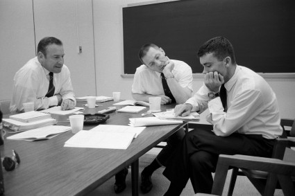 Days after surviving one of the space programme's most harrowing ordeals, Apollo 13 astronauts (from the left) Jim Lovell, Jack Swigert and Fred Haise work on their debriefing. Photo Credit: NASA