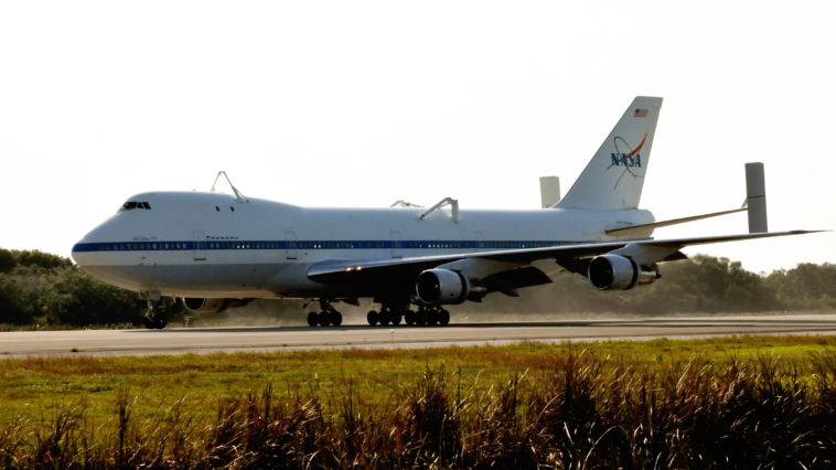 A modified NASA 747 Shuttle Carrier Aircraft, or SCA, arrives at Kennedy Space Center yesterday afternoon. The SCA will fly space shuttle Discovery to her new home next week at the Smithsonian National Air and Space Museum, Steven F. Udvar-Hazy Center in Chantilly, VA. Photo Credit: Julian Leek / Blue Sawtooth