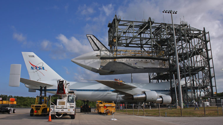 Space shuttle Discovery ready to be mated to NASA's modified 747 shuttle carrier aircraft earlier today. Weather permitting, Discovery will be flown from Kennedy Space Center to Dulles International Airport tuesday morning to go on permanent public display as a museum piece at the Smithsonian National Air and Space Museum, Steven F. Udvar-Hazy Center in Chantilly, Virginia. Photo Credit: Mike Killian