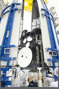Seen here, the AEHF-2 spacecraft is encapsulated within its fairing that will protect the $1.7 billion satellite. The AEHF-3 payload is of similar design and configuration. Photo Credit: Lockheed-Martin