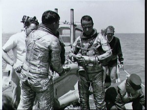 Five weeks before launch, Scott Carpenter and his backup, Wally Schirra (back to camera), undertake emergency water egress training for the mission. By his own admission, Schirra was furious to have been skipped for Carpenter, having trained for several months as Deke Slayton's backup. Photo Credit: NASA 