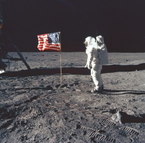 Buzz Aldrin poses with the Stars and Stripes on the Sea of Tranquility. Photo Credit: NASA
