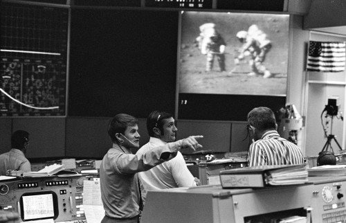 In Mission Control, Joe Allen, Dick Gordon and Director of Flight Crew Operations Deke Slayton confer as Apollo 15 astronauts Dave Scott and Jim Irwin work on the Moon in July-August 1971. Photo Credit: NASA