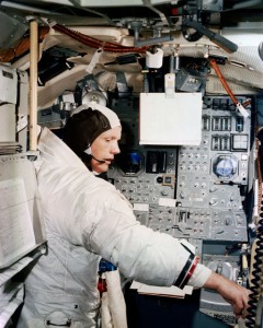 The tiny Lunar Module (LM) cabin is highlighted in this training view of Apollo 11 Commander Neil Armstrong, fully suited, as he was throughout the 21-hour stay on the Moon. Photo Credit: NASA