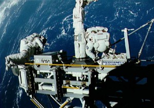 Kathy "K.T." Thornton and Tom Akers participate in the mission's record-breaking fourth EVA to perform Space Station evaluations. Photo Credit: NASA