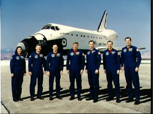 Pictured in front of Endeavour, the STS-49 crew conducted one of the most dramatic shuttle missions in history. From left to right: Kathy "K.T." Thornton, Bruce Melnick, Pierre Thuot, Dan Brandenstein, Kevin Chilton, Tom Akers and Rick Hieb. Photo Credit: NASA