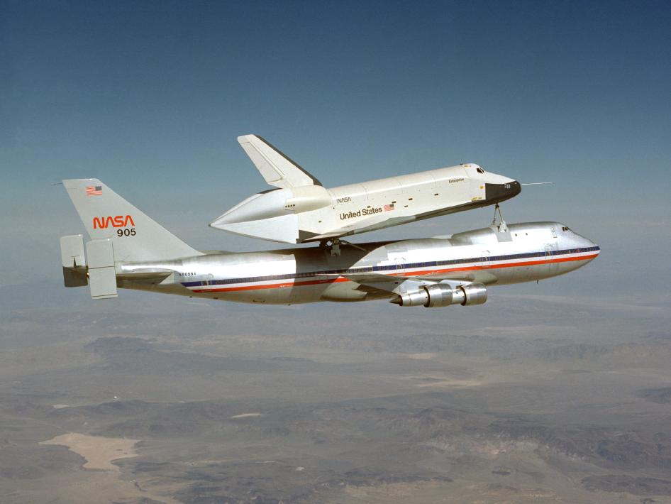 NASA's Shuttle Carrier Aircraft 905, still sporting its original American Airlines colors, is pictured here with shuttle Enterprise during the first of the shuttle program's Approach and Landing Tests (ALT) at the Dryden Flight Research Center, Edwards, California, in 1977. Photo Credit: NASA
