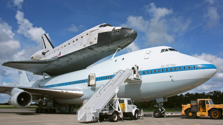 NASA's retired space shuttle Endeavour atop a modified Boeing 747 Shuttle Carrier Aircraft, ready for a final flight to California Tuesday morning. Photo Credit: Mike Killian / Zero-G News and AmericaSpace