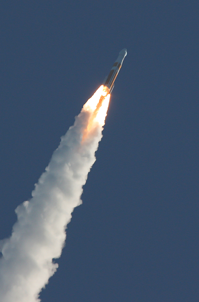 A Delta IV Medium+ 4,2 vehicle - with a 4-meter (13-foot) payload fairing and two Graphite Epoxy Motors (GEM)-60s - roars toward orbit with GPS IIF-3 in October 2012. Photo Credit: Mike Killian / Zero-G News
