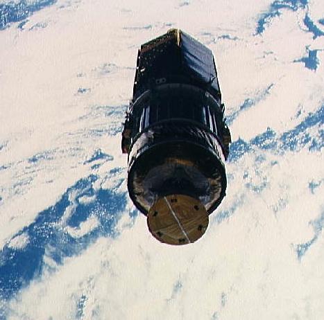 The Tracking and Data Relay Satellite (TDRS) - mounted atop its Boeing-built Inertial Upper Stage booster - drifts serenely away from Discovery, a handful of hours into the STS-26 mission. Photo Credit: NASA