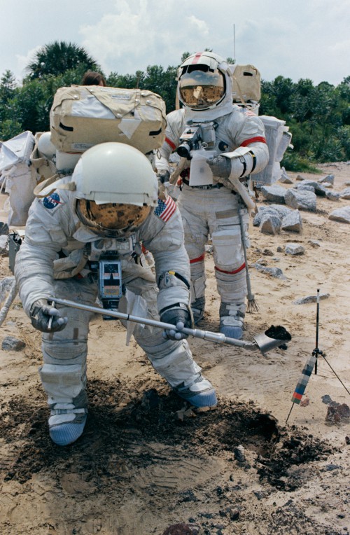 Despite their differences in background and military-civilian attitudes, Jack Schmitt (foreground) and Gene Cernan developed mutual respect for one another during the 16-month Apollo 17 training regime. They are pictured in September 1972 during suited geological equipment training. Photo Credit: NASA