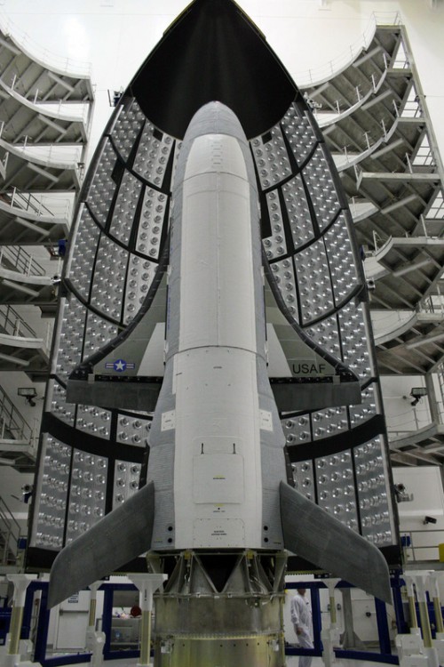 The X-37B OTV-3 vehicle being encapsulated in its Atlas-V payload fairing for launch on the OTV-3 mission. Photo Credit: US Air Force