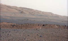 The environs of Gale Crater and the forbidding bulk of Aeolis Mons ('Mount Sharp') have already produced surprising data for Curiosity. The rover is presently less than a quarter of the way through its 'primary' two-year mission, raising hopes that more exciting discoveries lie just around the corner. Photo Credit: NASA