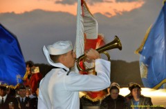 AmericaSpace image of Taps played by ETI Kyle Martin, U.S. Navy. Photo Credit: Julian Leek / Blue Sawtooth Studio