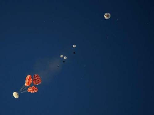 NASA conducted a test of the Orion spacecraft's parachute system today. Unlike the image posted here, today's test saw the intentional failure of one of the capsule's parachutes to see if the spacecraft could land safely on just two of its three parachutes. Photo Credit: NASA
