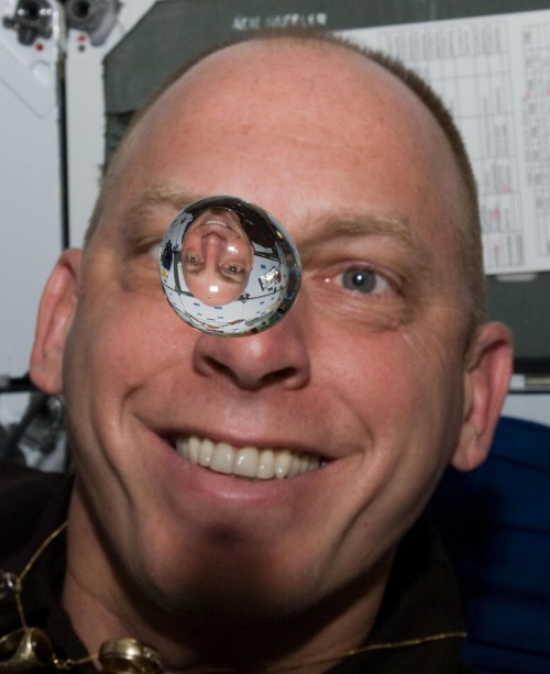 Clayton Anderson enjoys a light-hearted moment on board the international Space Station. Photo Credit: NASA