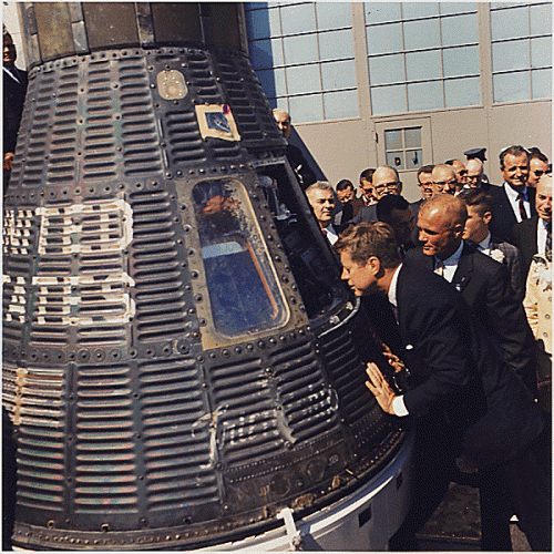 John Glenn shows President John F. Kennedy - the man who boldly committed the United States to landing on the Moon - the interior of his Friendship 7 capsule. Photo Credit: NASA