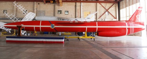 A bright red Snark missile grins from behind a podium within Hangar R. Photo Credit: Jason Rhian / AmericaSpace