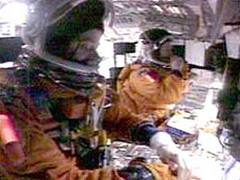 Not until the hot plasma breached the wheel wells, and severe controllability issues arose, would it appear that Rick Husband (background) and Willie McCool became aware of the catastrophe that was about to consume them. Photo Credit: NASA