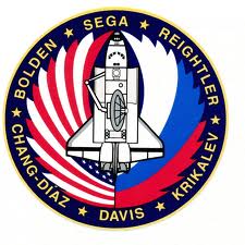 Girdled by the U.S. and Russian flags, the STS-60 patch represented a mission which marked the dawn of a new era. Photo Credit: NASA