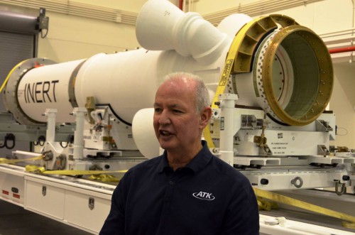 During a recent tour of the Launch Abort System Facility, former space shuttle astronaut Brian Duffy detailed how the Launch Abort System motor behind him will be used on the first test flight of the Orion spacecraft slated for next year. Photo Credit: Julian Leek / Blue Sawtooth Studio