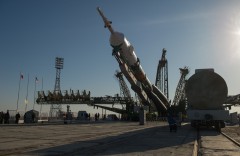The launch vehicle, bearing Soyuz TMA-08M, is erected to a vertical position at Baikonur Cosmodrome on 26 March 2013. Photo Credit: NASA