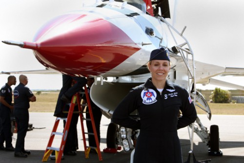 U.S. Air Force Major Caroline Jensen, the number three pilot for the Thunderbirds, poses for the camera in the lead up to the TICO Warbird Airshow scheduled to take place this weekend in Titusville, Florida. Photo Credit: Mike Howard / Cocoa Beach Photography