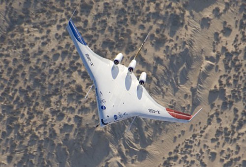 The unique X-48B Blended Wing Body subscale demonstrator banks over desert scrub at Edwards AFB. NASA photo / Carla Thomas