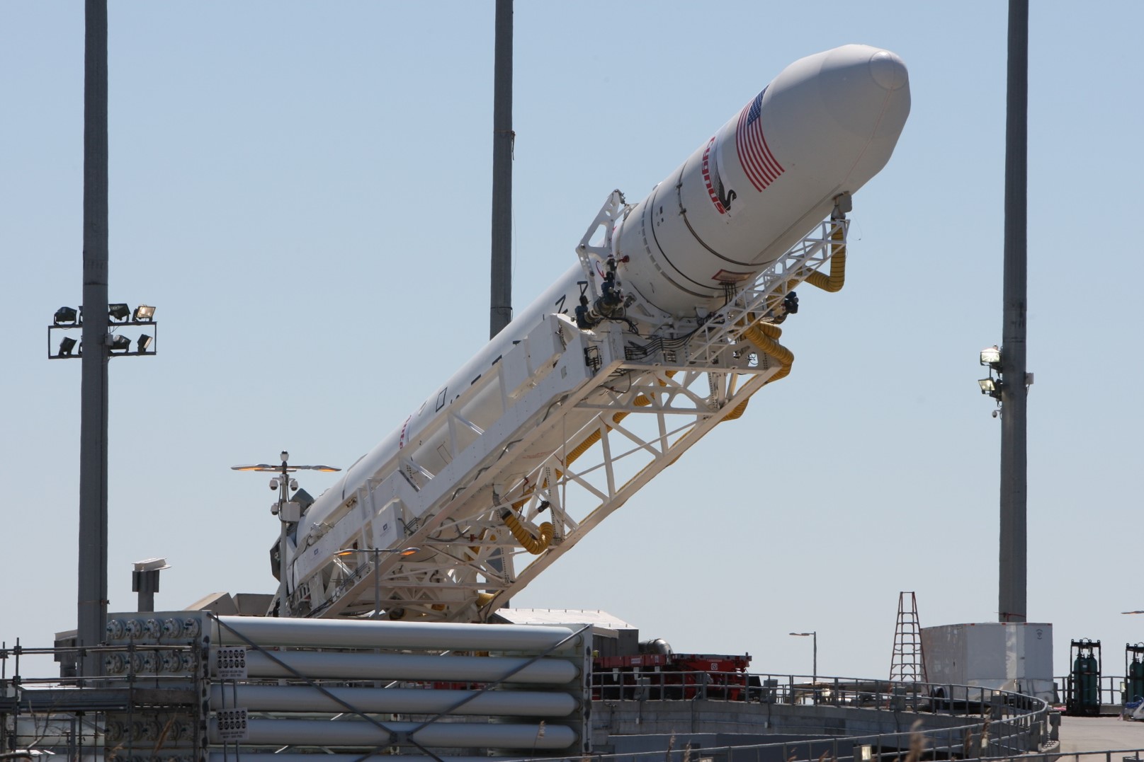 Orbital Sciences will honor the memory and achievements of G. David Low with its second Antares launch and the culmation of the Commercial Orbital Transportation Services (COTS) contract with NASA. Photo Credit: Mark Usciak / AmericaSpace
