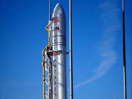 All dressed up and nowhere to go...at least, not yet. Orbital's Antares booster waits patiently on Pad 0A at the Mid-Atlantic Regional Spaceport (MARS), ahead of its maiden voyage. Today's launch attempt was scrubbed in the final minutes of the countdown. Photo Credit: Mark Usciak / AmericaSpace