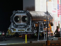 Antares' twin AJ-26 first-stage engines are clearly visible in this view of the pre-dawn rollout of A-ONE to the launch pad on 6 April 2013. Photo Credit: Mark Usciak / AmericaSpace