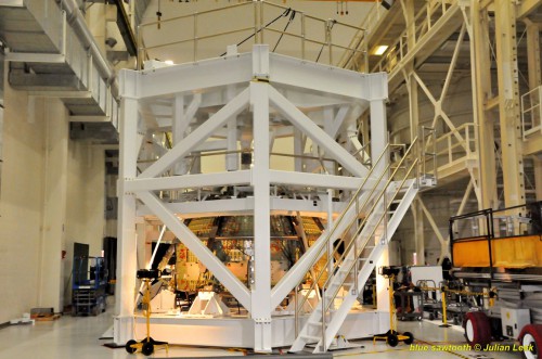 The flight test article of Orion is in a test structure that will be used to simulate launch and landing conditions. Photo Credit: Julian Leek / Blue Sawtooth Studio