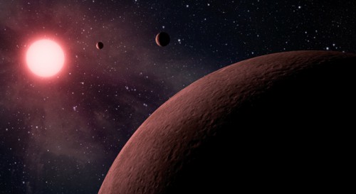 Illustration depicting a system of three rocky planets, each smaller than the Earth, found in orbit around the red dwarf KOI-961. Image Credit: NASA/JPL-Caltech